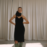 Woman wearing a black velvet dress with floral neck choker | Gina Kim