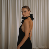 Woman wearing a black velvet dress with floral neck choker | Gina Kim