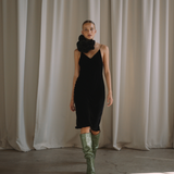 Woman wearing a black velvet dress with floral neck choker | Gina Kim