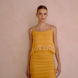 Short fringed knitted tank top and knee length skirt set | Gina Kim