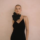 Woman wearing a black velvet dress with floral neck choker | Gina Kim