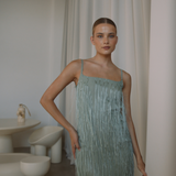Sage colour backless maxi dress with tassels all over the dress & strap and a side split | Gina Kim