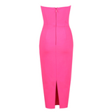 Strapless solid hot pink coloured mid-calf length dress, from the back | Gina Kim