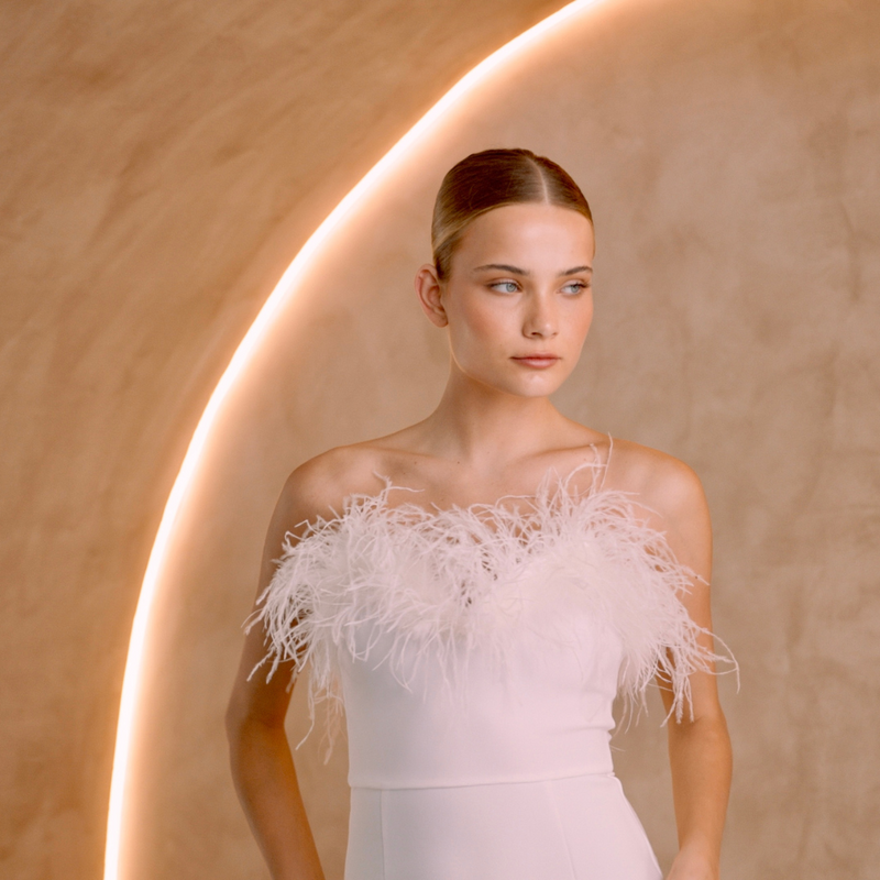 White Strapless ankle length dress with ostrich feathers close shot | Gina Kim